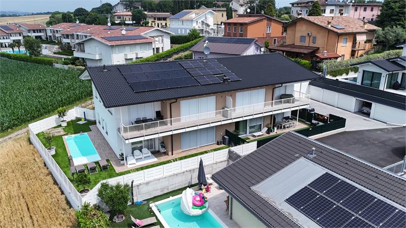 4-Zimmer-Wohnung im Erdgeschoss mit Garten und Garage